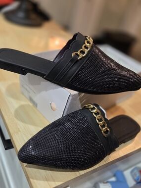Black Pointed Toe Slip-On Flats with Gold Chain Accent